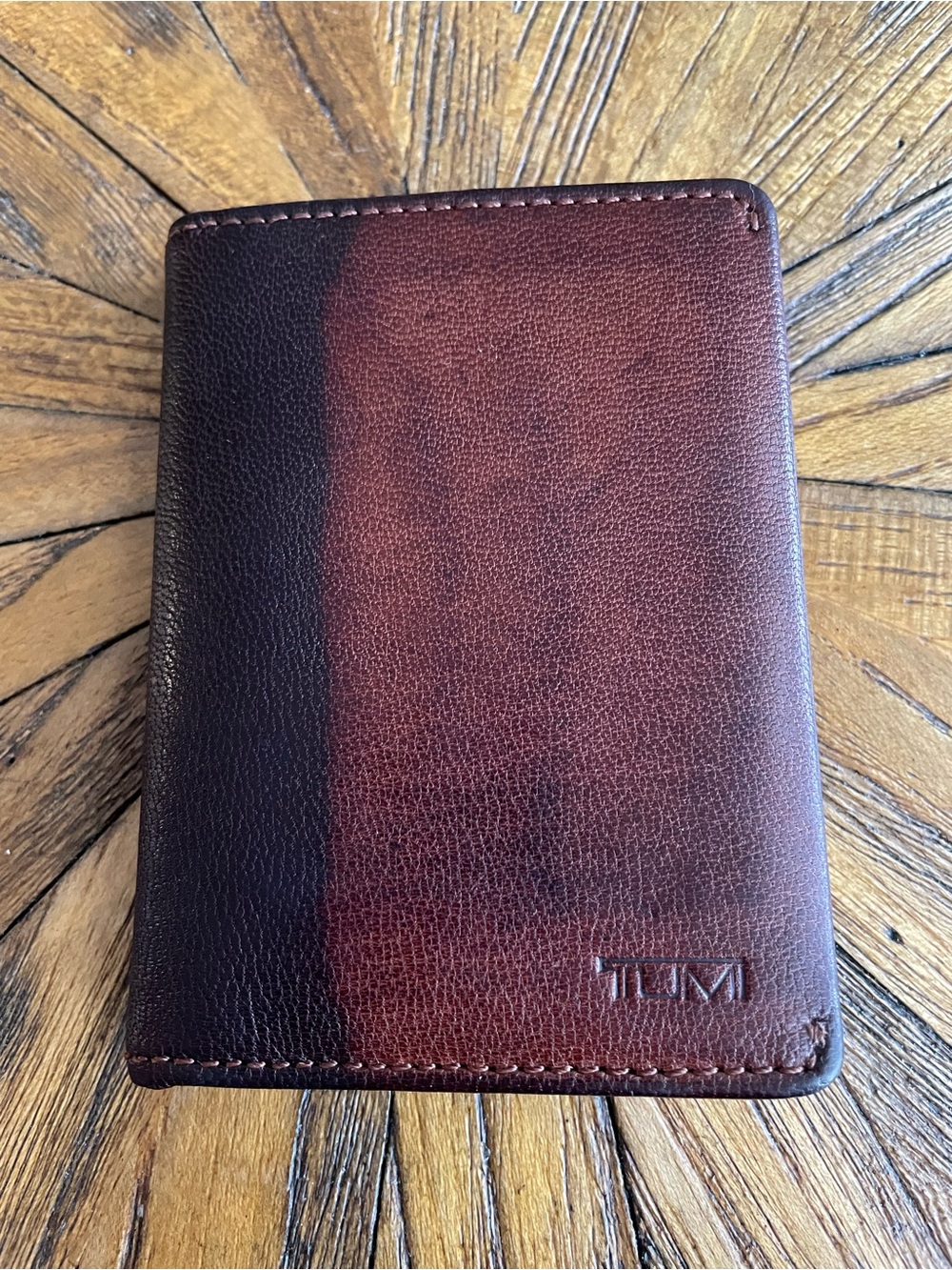 TUMI Leather Bifold Wallet in Brown and Dark Brown